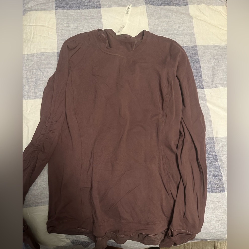 Lululemon long sleeve for sell!! Barely worn! Size 10.
